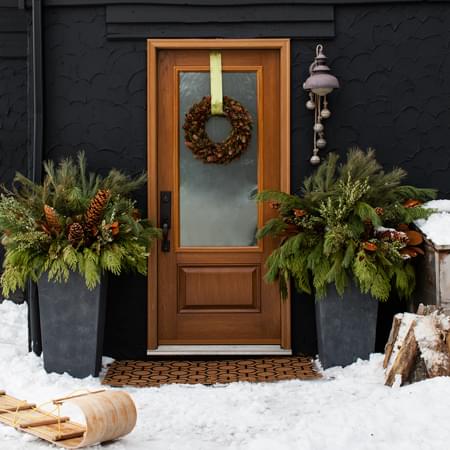 450x450-nov2013-pg107-donnagriffith-house-and-home-entryway-holiday-urns-13102_exterior1sled-2_finals_0